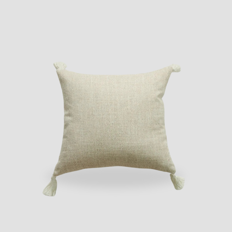 housse de coussin en lin pompons creme